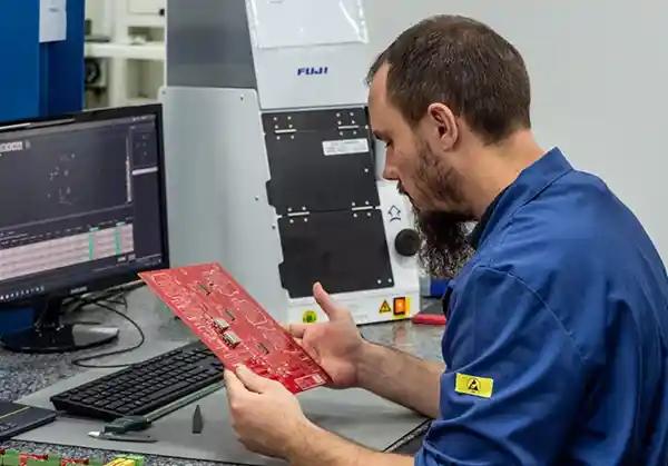 Technician-with-PCB-1 Technician With Pcb 1